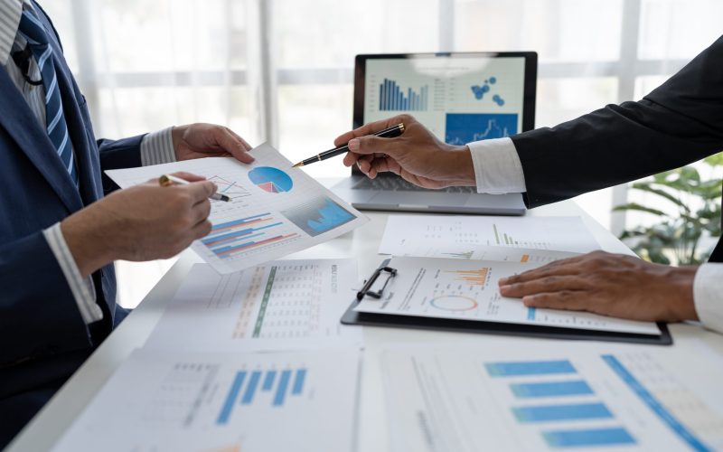 business people meeting in the office Calculate company tax and investment income Strategic planning and colleague brainstorming. Reports. Analyze charts. team work concept.
